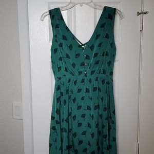 Asymmetrical dress w/ fan print criss-cross back